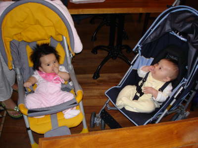 Izel & Emika - enjoying their thumbs