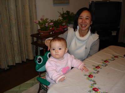 Sitting in Miki and Ken's Frog Chair